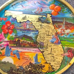 Set of three vintage Florida souvenir metal trays and coasters